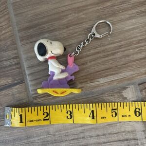 Peanuts SNOOPY Key Chain...Riding a Purple Easter Bunny Rocking‎ To